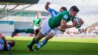 Ireland U20 fullback Jacob Stockdale scores the first try of the World Rugby U20 Championship semi-final against Argentina at Manchester City Academy Stadium. Photograph: Ryan Byrne/Inpho