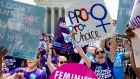 Pro-choice supporters celebrate outside the US supreme court after it struck down the requirement of doctors to have admitting privileges at local hospitals, among other restrictions. Photograph: Michael Reynolds/EPA