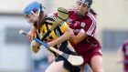Kilkenny’s Claire Phelan is tackled by Niamh McGrath of Galway in Saturday’s All-Ireland senior camogie clash in St Lachtain’s Park, Freshford, Kilkenny. Photograph: Ken Sutton/Inpho