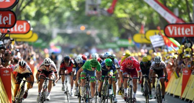 Slovakia’s Peter Sagan, wearing the best sprinter’s green jersey, wins the 209 km sixteenth stage of the 103rd edition of the Tour de France. Photograph: Getty Images