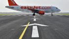 British airline easyJet said it could not predict the outcome for the end of the year after growing security concerns, weaker consumer confidence and currency volatility hit the group during its most profitable peak summer period.