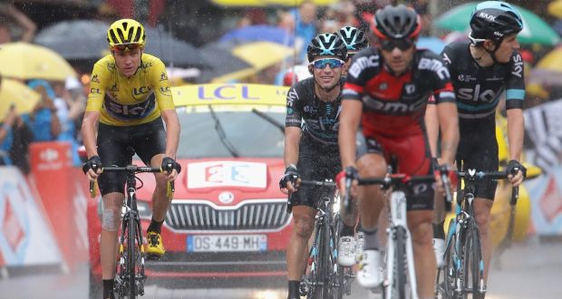Chris Froome of Team Sky looks on in the rain as he finished stage 20 of the 2016 Le Tour de France, from Megeve to Morzine. Photograph: Chris Graythen/Getty Images