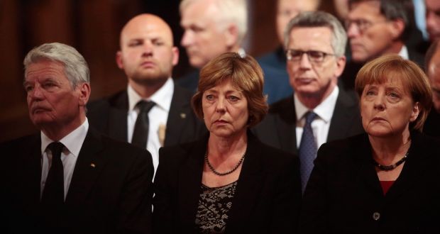  German president Joachim Gauck, his wife Daniela Schadt and  Chancellor Angela Merkel attend a memorial service for the victims of last week’s shooting spree in Munich, which left nine victims dead. Photograph:   Johannes Simon/Getty Images