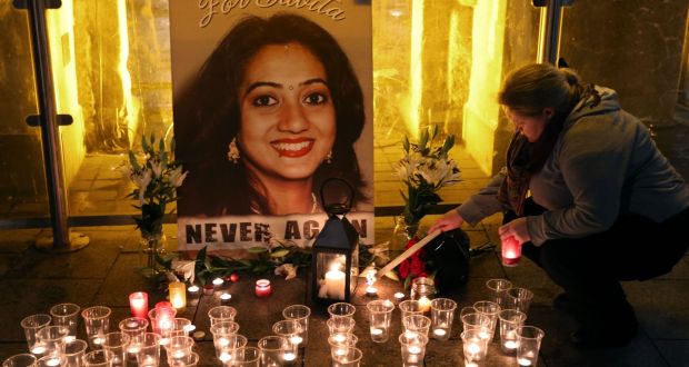 Candles are lit  at the vigil at Eyre Square in Galway to mark the first anniversary of the death of Savita Halappanavar. Photograph: Joe O’Shaughnessy. 