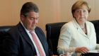 Germany’s economy minister, Sigmar Gabriel, and chancellor Angela Merkel. Mr Gabriel said EU trade-deal talks with the US had “de facto failed”. Photograph: Stefanie Loos/Reuters