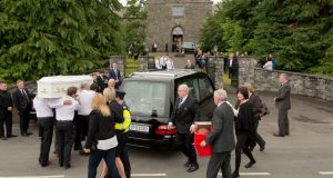 Mourners at the funeral of Alan Hawe (41), his wife Clodagh (39) and their sons Liam (13), Niall (11) and Ryan (6) at St Mary’s Church, Castlerahan, Co Cavan. Photograph: Dara Mac Dónaill/The Irish Times