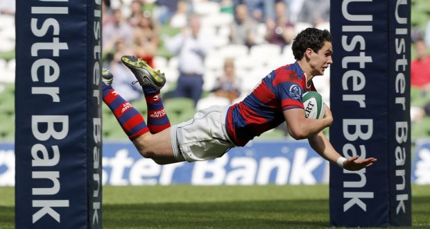 Joey Carbery scoring for  Clontarf: the outhalf had a stunning, two-try full competitive debut for Leinster in last week’s win over Treviso. Photograph: colm O’Neill/Inpho