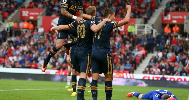 Tottenham Hotspur’s Harry Kane celebrates scoring his sides fourth goal of the match with team mates in their 4-0 win over Stoke City. Photo: Dave Thompson/PA