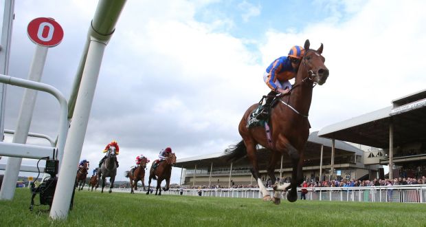 Churchill and Ryan Moore on the way to Group 1 success at the Curragh. Photograph: PA