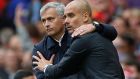 Manchester United manager José Mourinho and Manchester City manager Pep Guardiola at the end of the derby game. Photograph: Reuters