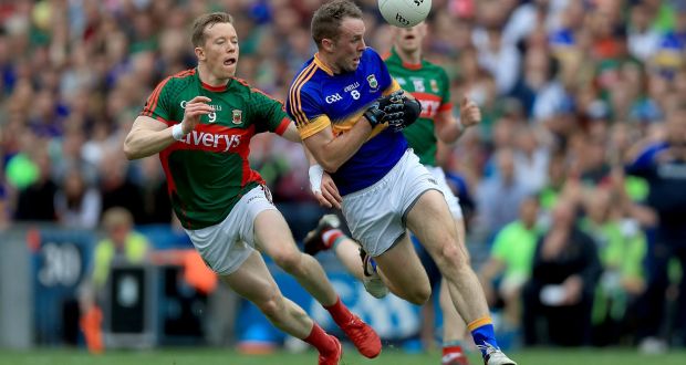 Mayo’s Donal Vaughan with Peter Acheson of Tipperary during their All-Ireland SFC semi-final at Croke Park. Photo: Donall Farmer/Inpho
