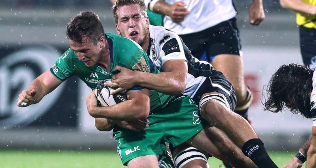 Connacht’s Jack Carty is  tackled by Edoardo Padovani of Zebre during the  Guinness Pro 12 game at  Lanfranchi Stadium in Parma. Photograph: Matteo Ciambelli/Inpho