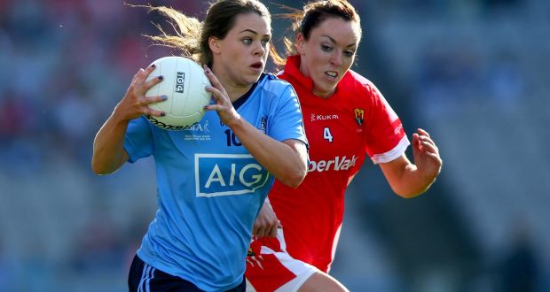 Dublin’s Noelle Healy is pursued by Cork’s Aisling Barrett in the All-Ireland women’s football final in 2014. This season is 25-year-old Barrett’s ninth year on the Dublin panel. Photograph: Donall Farmer/Inpho