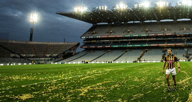 Kilkenny’s JJ Delaney leaves the field as the sky turns dark after the All-Ireland hurling final replay between Kilkenny and Tipperary in 2014. Photograph: James Crombie/Inpho