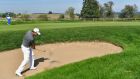 Pádraig Harrington  plays a bunker shot during the second round  of the Porsche European Open at Golf Resort Bad Griesbach  in Passau, Germany. Photograph: Stuart Franklin/Getty Images