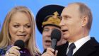 Russia’s president Vladimir Putin and   singer Larisa Dolina sing the Russian national anthem at a concert in Moscow in March, 2015, to mark the first anniversary of the annexation of Crimea. Photograph: Maxim Shipenkov/EPA