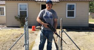 Colton del Bosque, a 27-year-old road maintenance worker who lives in Alamo with his wife Stevie and three children. “I like my guns, and I don’t like [the idea] that you couldn’t borrow my gun.  Hillary’s already said she don’t like guns.”  Photograph: Ruadhán Mac Cormaic