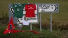 Signs point the way to Killaloe in Co Clare, where the coffin of Munster Rugby head coach Anthony Foley has been brought to repose in St Flannan’s Church, ahead of his funeral on Friday. Photograph: Niall Carson/PA Wire