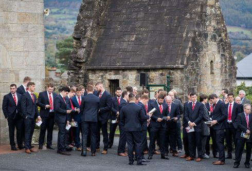 Munster players arrive for the funeral of Anthony Foley in Co Clare. Photograph: Ryan Byrne/Inpho
