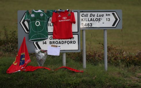 Signs point the way to Killaloe in Co Clare where the coffin of Munster head coach Anthony Foley was brought to repose in St Flannan's Church. Photograph: Niall Carson/PA Wire
