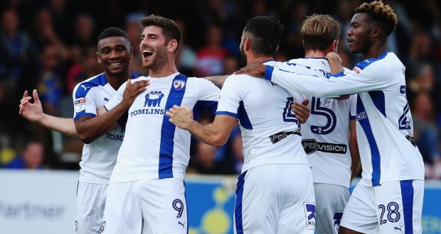 Ched Evans celebrates scoring one of his four goals so far this season for Chesterfield. Photograph: Ker Robertson/Getty Images