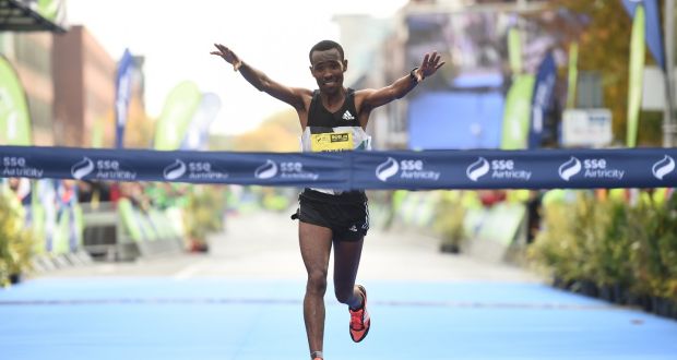 Dereje Debele Tulu from Ethiopia crosses the line to win the SSE Airtricity Dublin Marathon 2016. Photograph: Stephen McCarthy/Sportsfile