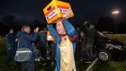  East Kilbride captain Barry Russell celebrates with the players and staff with beer presented by Ajax club officials after winning the 27th consecutive game against BSC Glasgow FC. Photo: Mark Runnacles/Getty Images