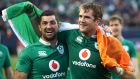 Ireland players Rob Kearney (left) and Jamie Heaslip celebrate following their 40-29 victory over New Zealand. Photograph: Getty 