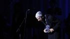 Leonard Cohen takes a bow on stage in  Toronto in 2008. Photograph:  Aaron Harris/AP Photo/The Canadian Press