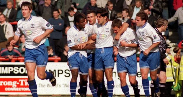 Andy Woodward, middle, celebrates with his Bury team-mates after a goal against Brentford in March 1997. Photograph: Matt Risby/Action Images