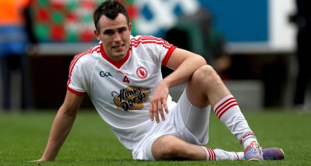 Tyrone’s Cathal McCarron after losing to Mayo in the 2013 All-Ireland semi-final to Mayo. Photograph: Inpho