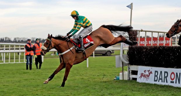 Coney Island ridden by Mark Walsh clears the last on the way to winning the Bar One Racing Drinmore Novice Steeplechase. Photo: Donall Farmer/Inpho