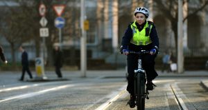 Garda Laura Conlon: “As well as the usual burglaries, road traffic accidents and domestic violence that we may have to deal with, we will also receive plenty of calls from people looking for advice.” Photograph: Dara Mac Dónaill 