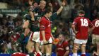 Munster players contemplate their second Heineken Cup final defeat in three seasons as Leicester’s Neil Back celebrates at the end of the 2002 final at the Millennium Stadium. Photograph: Patrick Bolger/Inpho