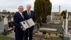  David Blake (left) donates the largest known remnant of the 1916 Jacob’s tricolour to John Green of Glasnevin Trust. Photograph: Cyril Byrne