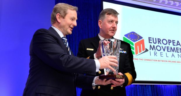 Taoiseach Enda Kenny presenting the European Movement Ireland European of the Year Award to Vice Admiral Mark Mellett. Photograph: Cyril Byrne