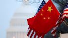 The People’s Republic of China flag and the US Stars and Stripes fly on Pennsylvania Avenue in Washington during a visit by then Chinese president Hu Jintao in 2011. Photograph: Hyungwon Kang/Reuters