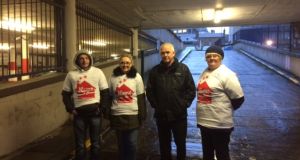 Activists pictured at the gates of Apollo House on Friday morning. Photograph: Nora-Ide McAuliffe/The Irish Times
