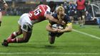 Clermont winger  Nick Abendanon gets through the tackle of Ulster fullback Charles Piutau to score a try in the Champions Cup game at  Stade Marcel-Michelin. Photograph: Thierry Zocolan/Inpho/Presseye/