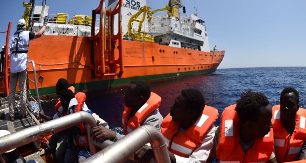 Refugees are rescued by SOS Mediterranée and Médecins Sans Frontières  off the Libyan coast on May 24th, 2016.  Photograph: Gabriel Bouys/AFP/Getty 