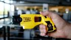 File image of a Taser device being tested. File photograph: Getty Images
