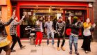 Alternative & progressive hip hop group ApocalypsE perform outside  Smiley Dogg tattoo parlour in Cork city