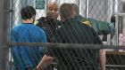 Esteban Santiago (26), the suspect in the deadly shooting at Fort Lauderdale-Hollywood International Airport, is transported to the Broward County Main Jail by authorities on Saturday in  Fort Lauderdale, Florida. Photograph: (Jim Rassol/South Florida Sun-Sentinel via AP