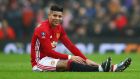 Marcos Rojo picked up an injury during the first half of Manchester United’s 4-0 FA Cup win over Reading. Photograph: Getty/Clive Brunskill