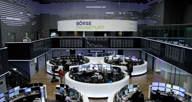 Traders at the stock exchange in Frankfurt: European stocks were little changed late on Tuesday morning. Photograph: Reuters
