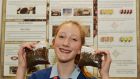 Emily Murphy from St Mary’s Secondary School Mallow with her project on the production and combustion of fuel pellets made from waste coffee grounds at this Years BT Young Scientist & Technology Exhibition. Photograph: Alan Betson/The Irish Times
