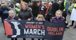 Alana Kirk with her children Daisy (11), Poppy (9) and Ruby (6), taking part in the Women’s March in Dublin. Photograph: Dara Mac Dónaill 