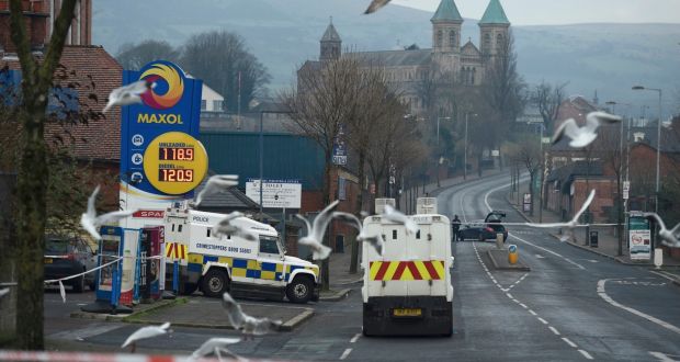 Police at the scene of the  shooting at a petrol station on the Crumlin Road in Belfast. Photograph: Clodagh Kilcoyne/Reuters