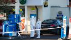 Forensic officers attend the scene on the Crumlin Road in Belfast where a PSNI officer was shot on Sunday night. Photograph: Liam McBurney/PA Wire