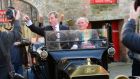 Taoiseach Enda Kenny, with Eamon Creamer, owner of the 1916 Ford Model T,  following the launch of the Action Plan for Regional Development in Ballymahon, Co Longford. Photograph: Dara Mac Dónaill/The Irish Times